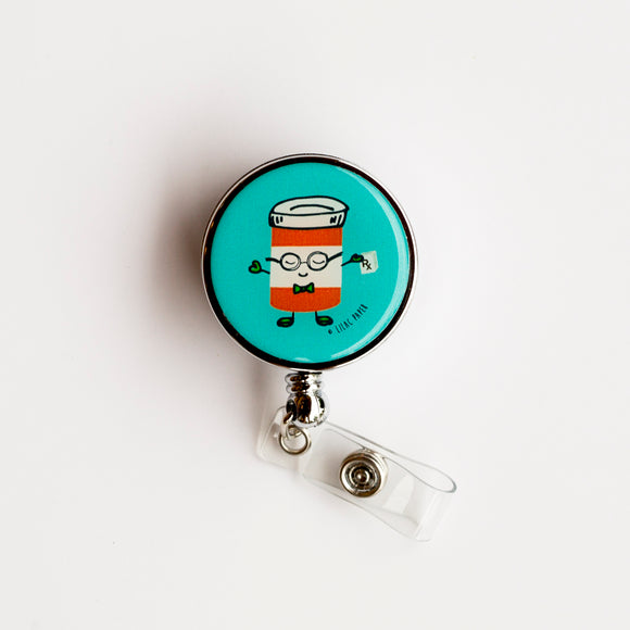 Lilac and Friends dental badge reel with animated orange pill bottle on a turquoise background. Adder-Al dental badge reel for dental professionals by Lilac Paper.