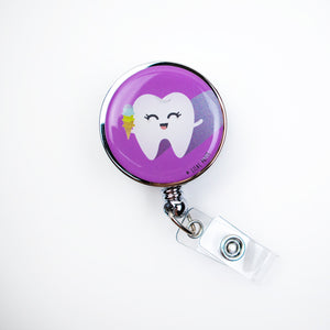 Lilac and Friends dental badge reel with happy-faced tooth holding an ice cream cone stacked with ice cream on a purple background. Yummy dental badge reel for dental professionals by Lilac Paper.